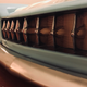 Illustration for article titled GM Clay Sculptor Buys The Shittiest Car In The Junkyard And Turns It Into His Sons Bed